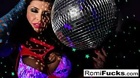 romi plays with disco ball then stuffs toys deep in her pussy at nightclub