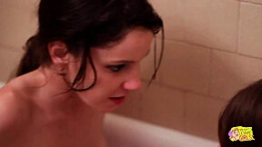 Two Lesbians Get Busy in Hotel Bath Rooms