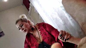 mature slut wife teases with ponytail and cock-filled mouth