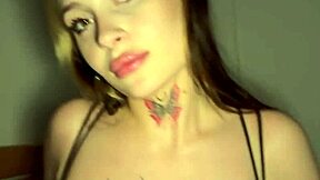 Tattooed Young Hottie Swallows Fake Cum Load
