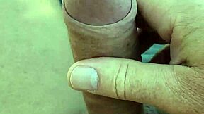 jerking naked cock slowly in shade on sunny lounger