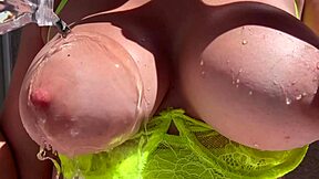 Artemisia Love Exposes Massive Tits Outdoor with Water Play