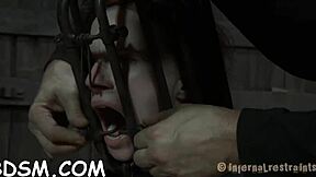cute bound girl endures tight bondage ropes and toys in intense session