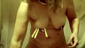 french milf slave pinned with nipple clamps and belt whipped in outdoor bdsm humiliation