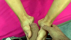 Big tits blonde model strokes feet while fingering her wet pussy in fetish play