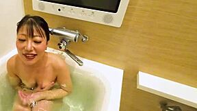 sexy japanese brunette rides lover's cock cowgirl in hotel bed after pool blowjob
