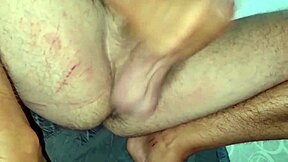 italian guy strokes cock with finger in ass
