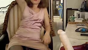 Amateur slut in pink satin dress deepthroats and fucks