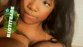 Nerdy ebony teases tits with vibrator