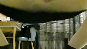 Transsexual in black dress performs handjob with massive cumshot finish