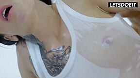 Tattooed babe in oiled bodysuit rides cowgirl then gets fucked doggy she cant stop moaning