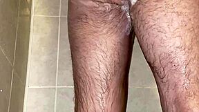 Im taking a shower with a chastity belt on my penis