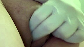 Im masturbating in the bathroom wearing white medical gloves and examining myself but it feels good to examine myself wearing gloves so im trying out what it feels like to masturbate