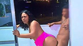 latina slut fucking and sucking cock on a balcony overlooking the public street in medellin a wet blowjob and a frenetic fuck while she is being fucked the cars pass by on the road venezuelan bitch