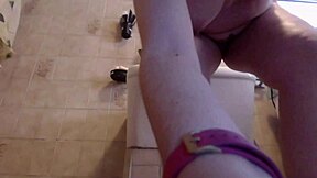Nicoletta cleans sneakers in bathroom