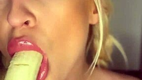 Horny college girl sucks on banana