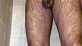 Im taking a shower with a chastity belt on my penis