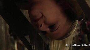 Bound lesbian slave takes strapon doggystyle and orgasms