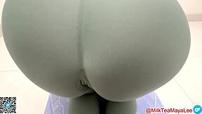 super round butt asian in tight green leggings with puffy cameltoe
