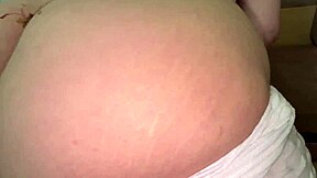 a stepmom with gorgeous ass and heavy breasts bent over the sofa for stepson