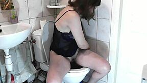 naked girl fingers her wet pussy for orgasm