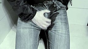 amateur pees in jeans while on toilet