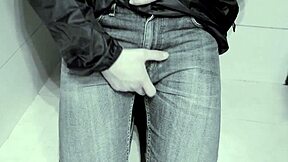 amateur pees in jeans while on toilet