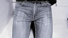 amateur pees in jeans while on toilet