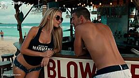 Super blonde babe enjoys beach party action