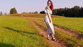 Red-haired beauty in the field