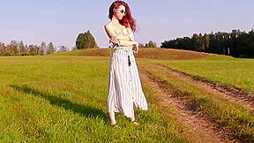 Red-haired beauty in the field