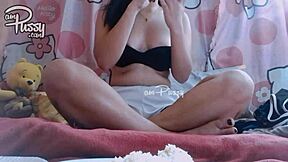 Asian amateur girl is eating food naked at home