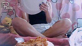 Asian amateur girl is eating food naked at home