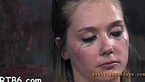 Gagged angel receives furious whipping on her tits