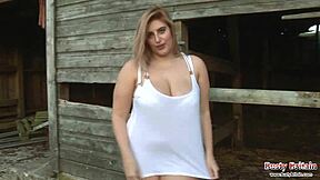busty bbw raphaella strips and plays on farm