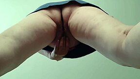A secretary risky masturbates in the office while her boss is out for lunch