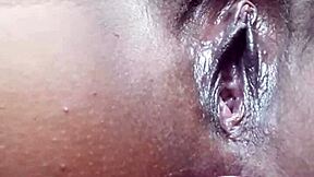 Young girl dances intensely in mini dress with plug