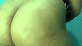 Young girl dances intensely in mini dress with plug