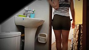 colombian university student peeing in bathroom