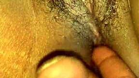 Hairy pussy teased by fingers and tongue suggestively. Explore the wet folds slowly.