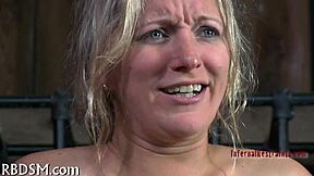 Real punishment unfolds as she faces harsh consequences for her actions. The scene gets intense fast.