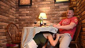 Crazy teen sucks cock under cafe table.