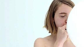 young babe blows her first balloon