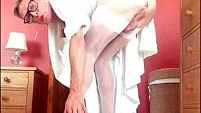 Shemale in stockings shows cock