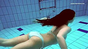 Watch Alla swim naked and tease in hot pool