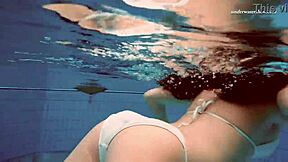 Watch Alla swim naked and tease in hot pool