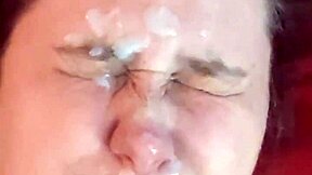 I watch as amateur gets her face covered in cum.