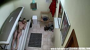 Pierced Pussy Caught Naked in Tanning Bed Voyeur Clip