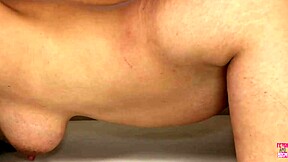 A guy covers brunette's pregnant belly with oil and slides dick inside pussy