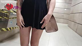 Cristina Almeida teases salesman in shoe store.